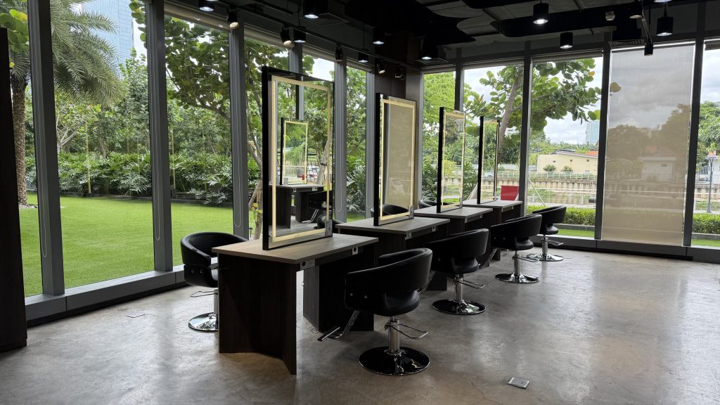 Styling chairs by the window with the garden outside
