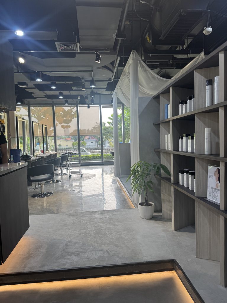 Inside the salon: the walkway and step with floor lighting